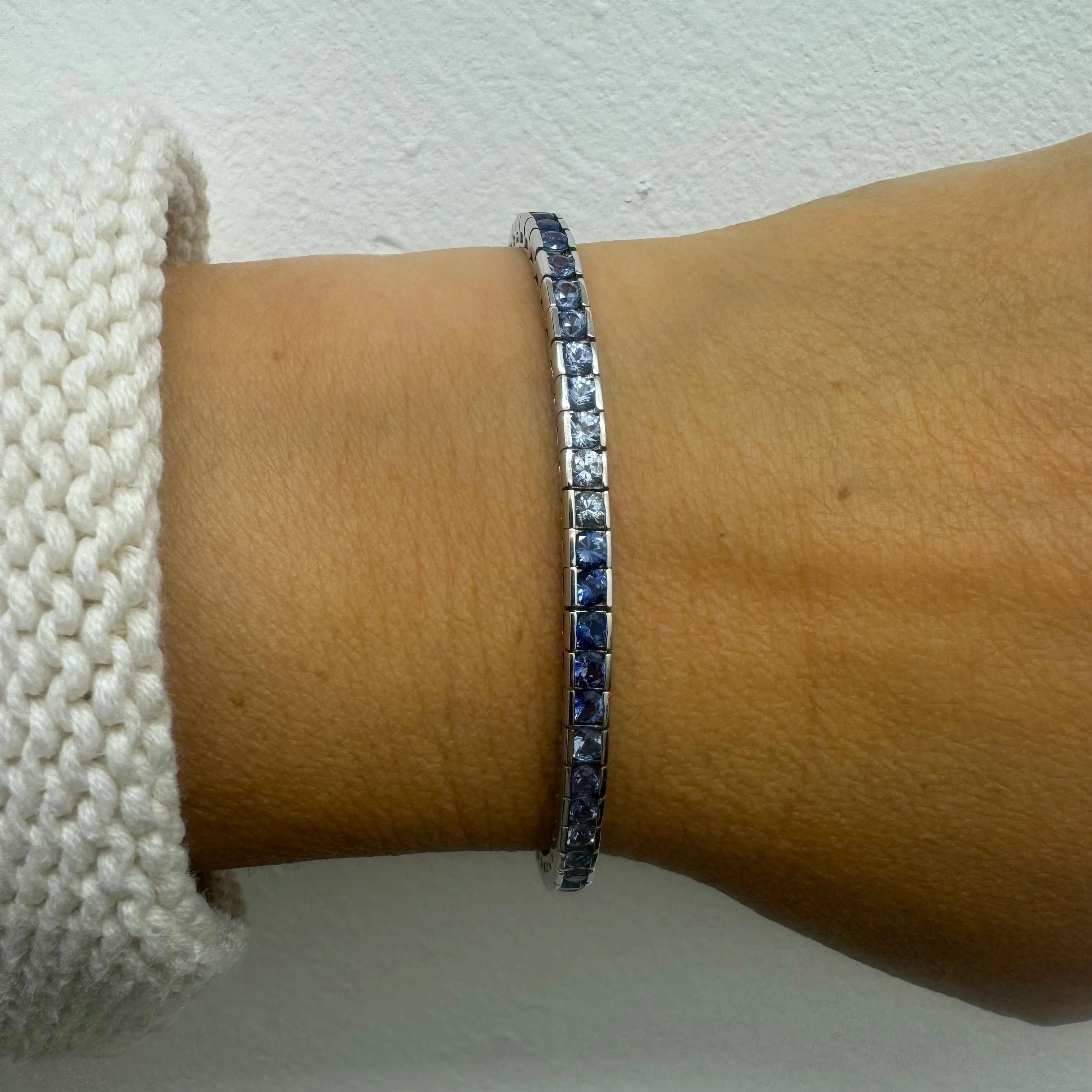 14K gold Tennis Bracelet set with different shades of Sapphire