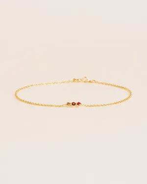 Bracelet with cream diamond, ruby and garnet in 18 ct. gold