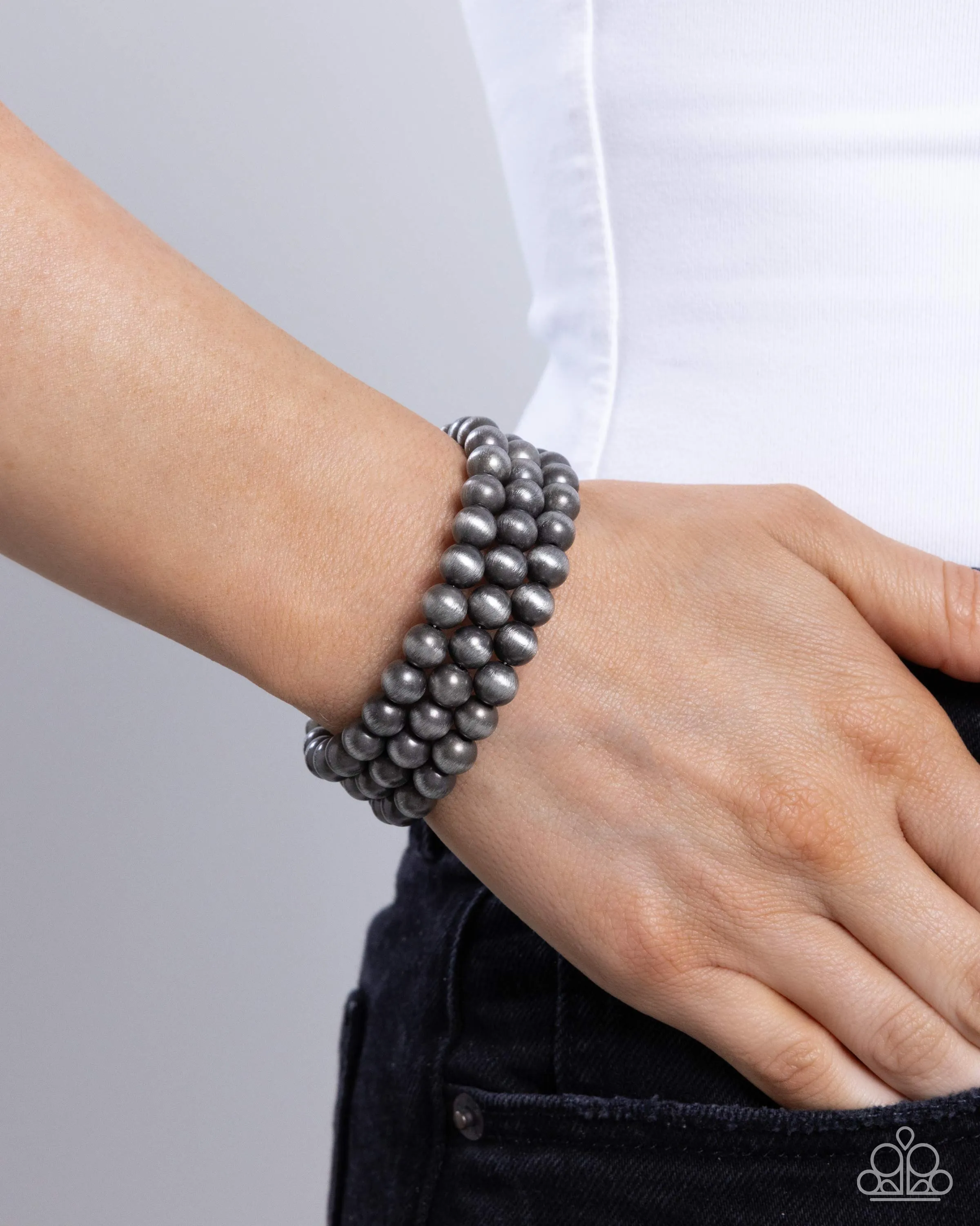 Coiled Catwalk - Silver - Navajo Pearl Bead Paparazzi Coil Bracelet