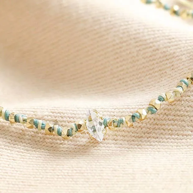 Crystal Blue and White Beaded Cord Bracelet in Gold