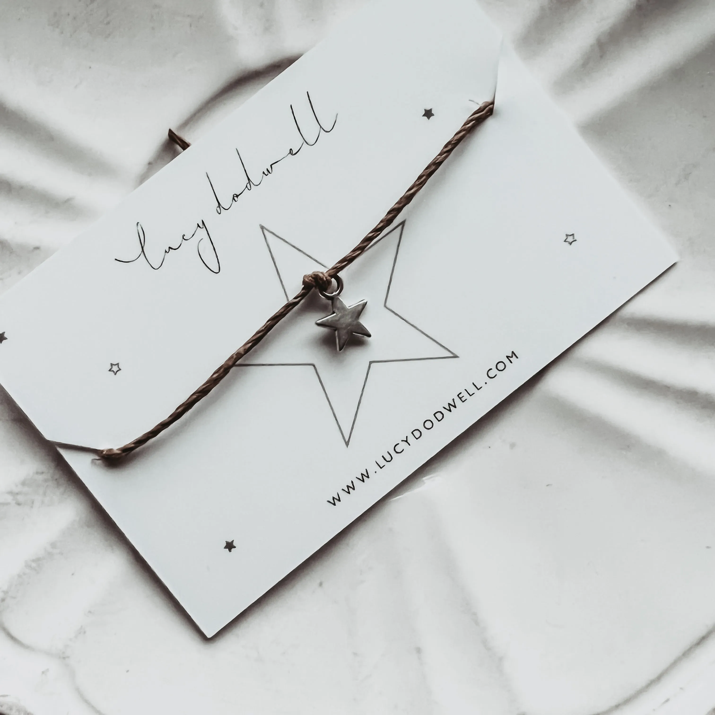 Little silver star bracelets
