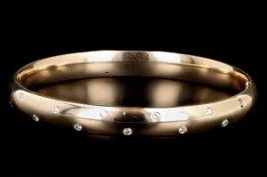 Modern 14K Yellow Gold .35 Carat Round Brilliant Diamond Bangle