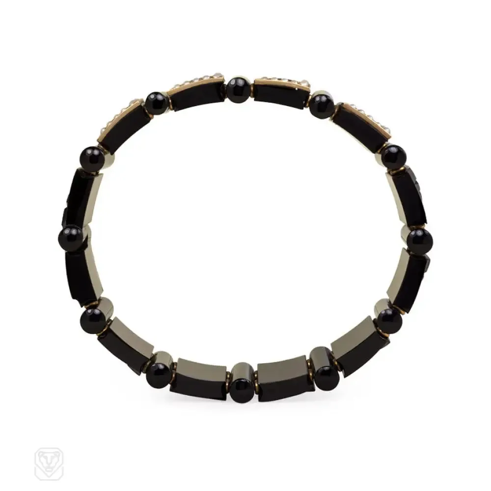 Pair of antique onyx plaque bracelets with pearls