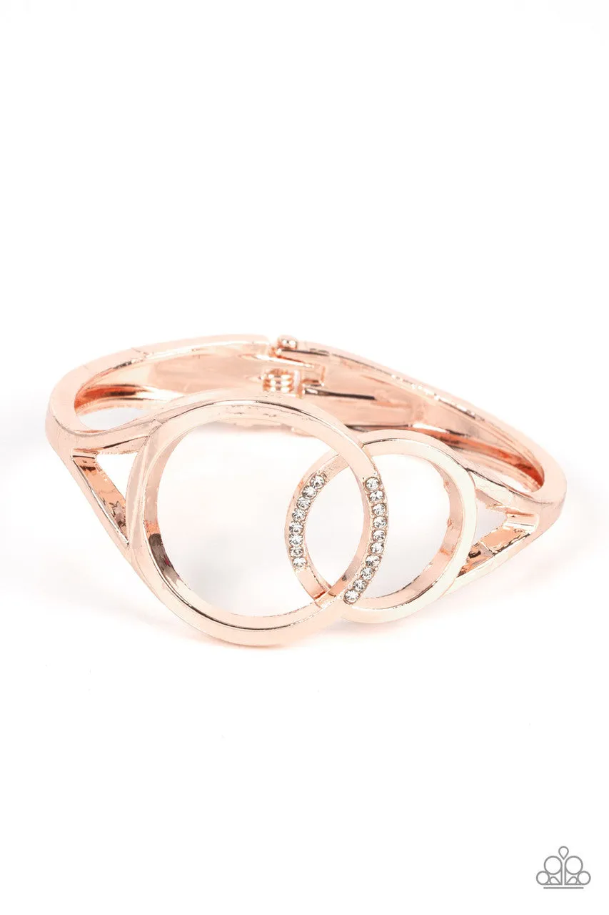 Scope of Expertise - Rose Gold - White Rhinestone Overlapping Circles Paparazzi Hinge Bracelet