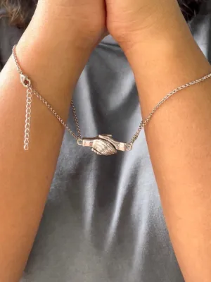 (Set of 2) Silver Plated Hand Holding Magnet Bracelets