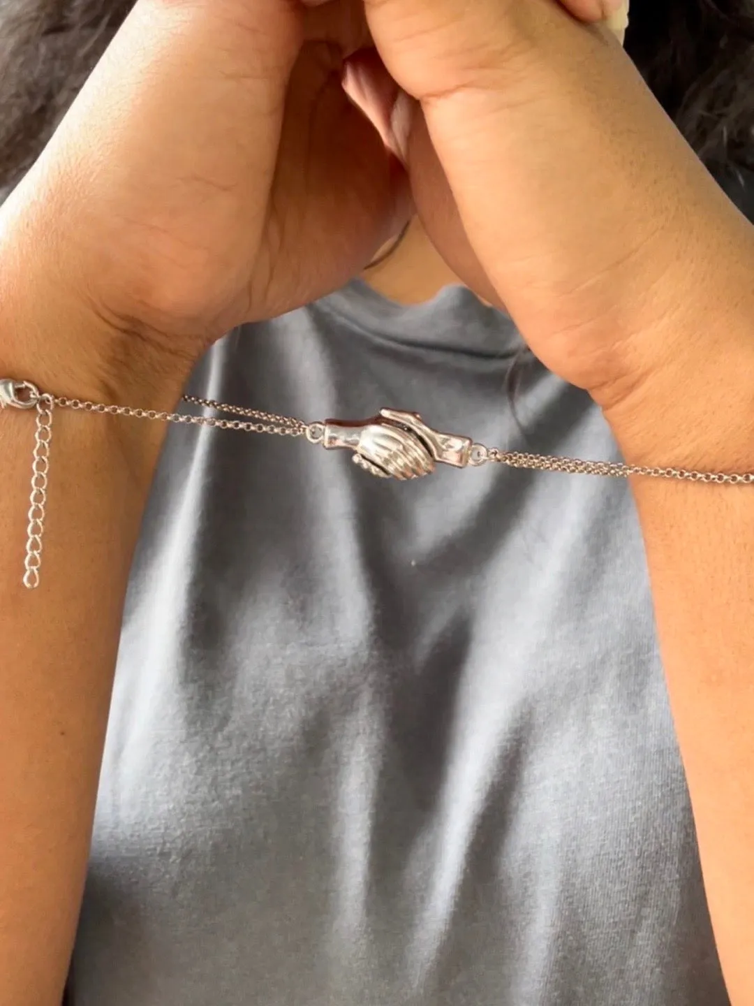 (Set of 2) Silver Plated Hand Holding Magnet Bracelets